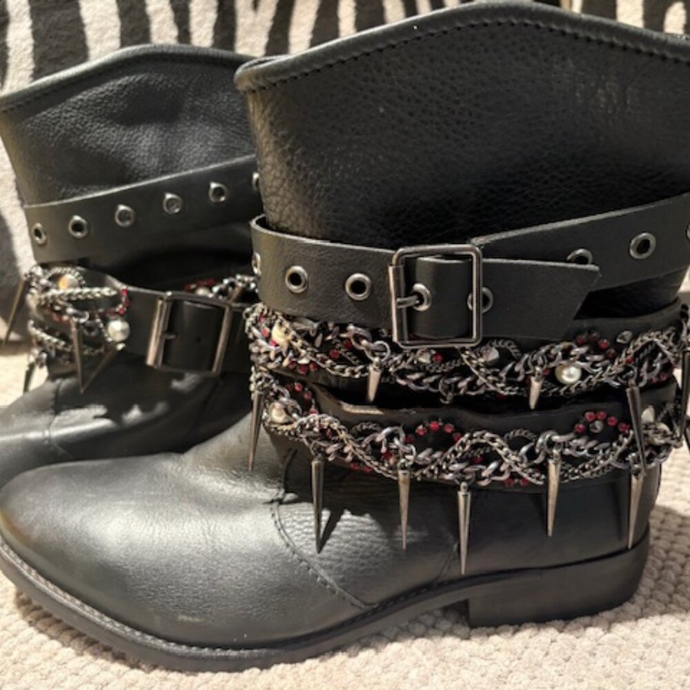Embellished black short boots.